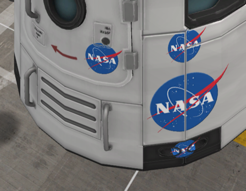 NASA logos projected onto a capsule
 